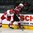 GRAND FORKS, NORTH DAKOTA - APRIL 24: Denmark's Casper Mortensen #18 and Latvia's Lukass Sicevs #16 battle for the puck during relegation round action at the 2016 IIHF Ice Hockey U18 World Championship. (Photo by Matt Zambonin/HHOF-IIHF Images)

